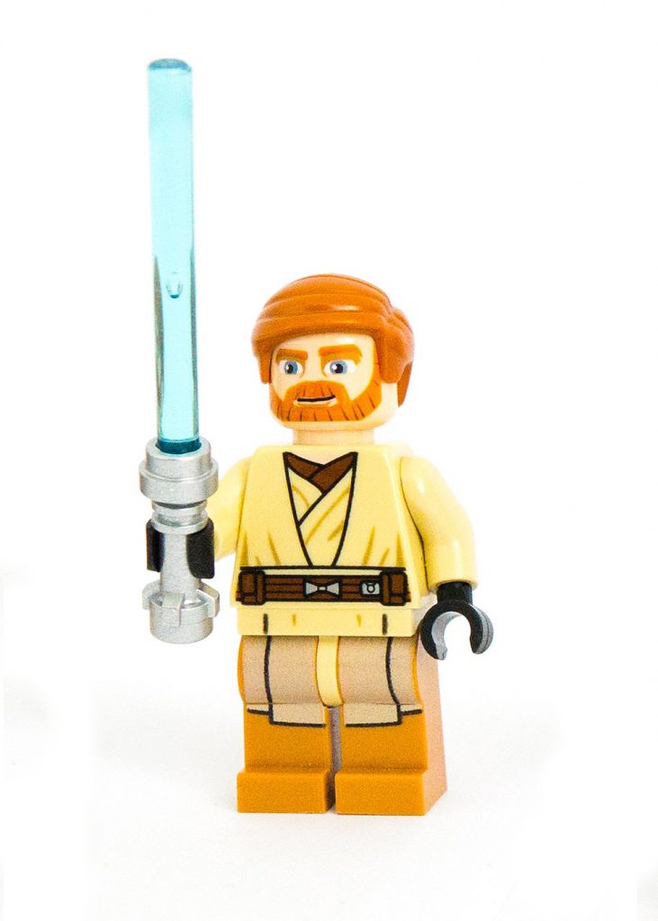 Luke Skywalker von Star Wars als Spielzeugfigur. Er hält ein blaues Leuchtschwert in der Hand.